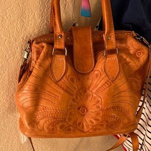 Vintage tooled handbag